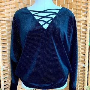 Jennifer Lopez black blouse